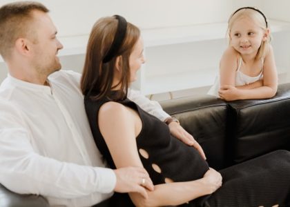 A loving family shares a tender moment, embracing joy and connection.